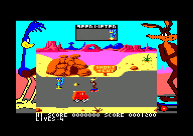 Road Runner (Amstrad CPC) screenshot: I need to avoid the truck. Wile E. has found some rocket skates.