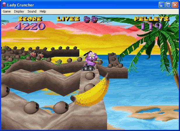 Lady Cruncher (Windows) screenshot: This is the start of level two. The maze and the pellets have changed but the power ups are still big bananas
