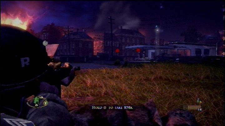 Brothers in Arms: Hell's Highway (PlayStation 3) screenshot: Shoot the tanks at the gas pump to clear out the enemy with as few bullets as possible.