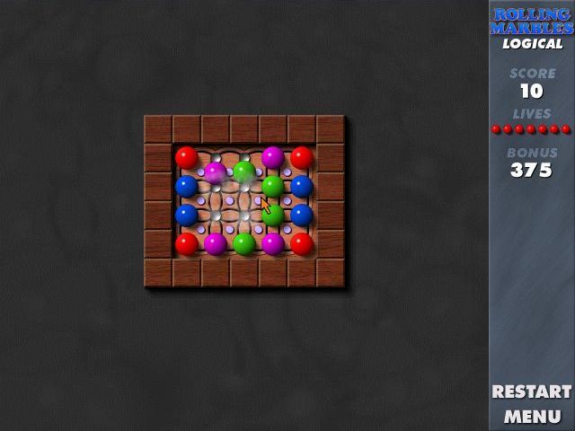 Rolling Marbles (Windows) screenshot: Level One: When four marbles come together they disappear and the player scores points. In a Logcal puzzle the marbles are not replaced.