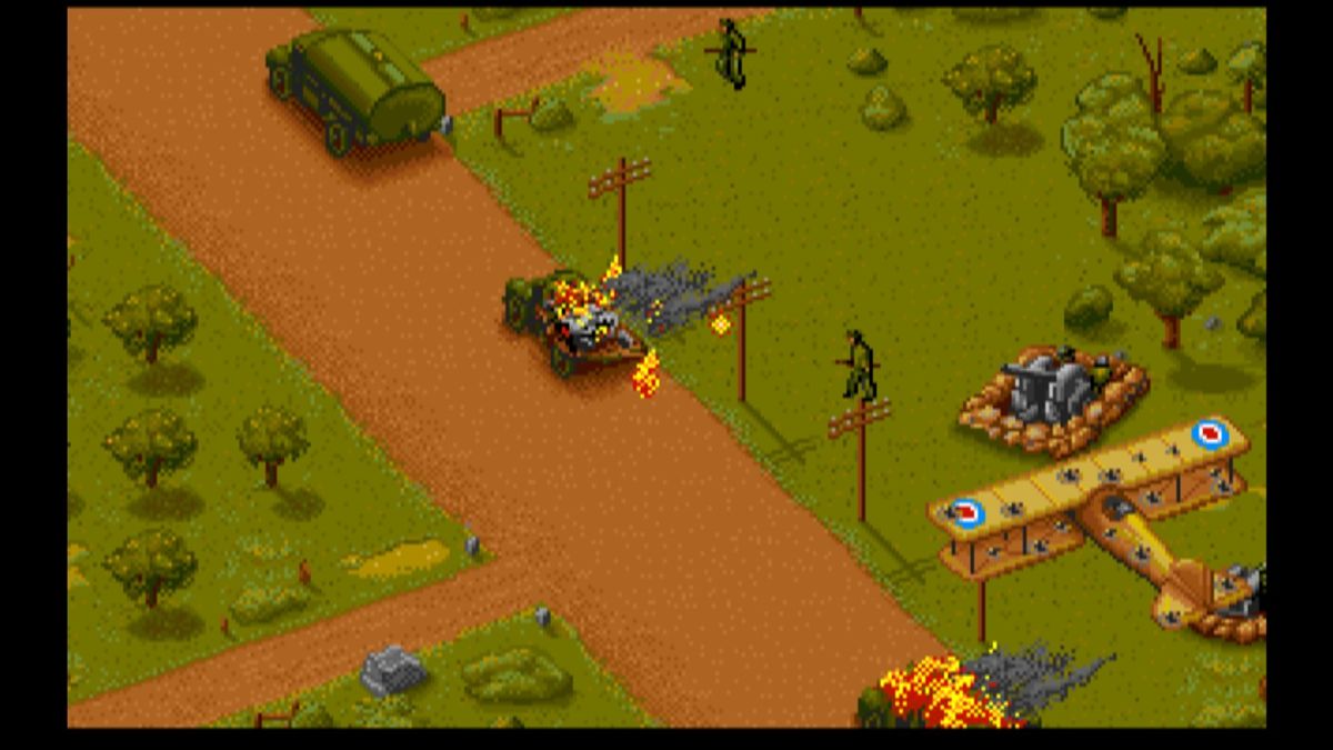 Wings (Macintosh) screenshot: Watch out for AA guns when strafing convoy, one hit and you're going down (GOG version)