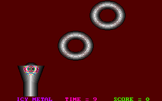 Icy Metal (DOS) screenshot: Game 3 - ball just launched, some graphics anomalies in funnel.when launched, the ball will keep bouncing until hitting a torus.