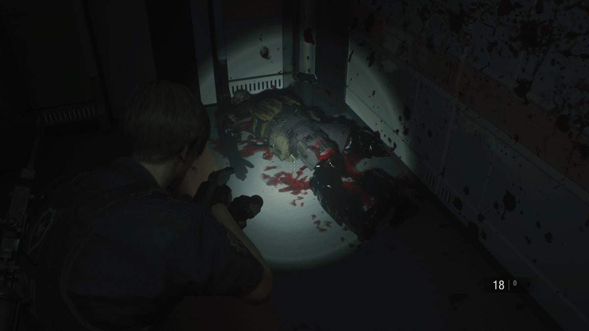 Resident Evil 2 (PlayStation 4) screenshot: Japanese Z Version is less censored and shows blood color and limbs, but severed limbs turn all black as charcoal