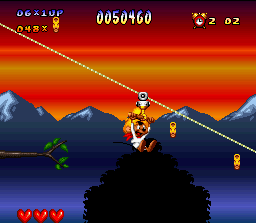 Speedy Gonzales in Los Gatos Bandidos (SNES) screenshot: Speedy in a chairlift. Or it would be a "handlift"?