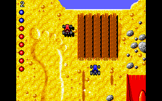 Micro Machines (DOS) screenshot: Whoops, I'm about to fall into the water...