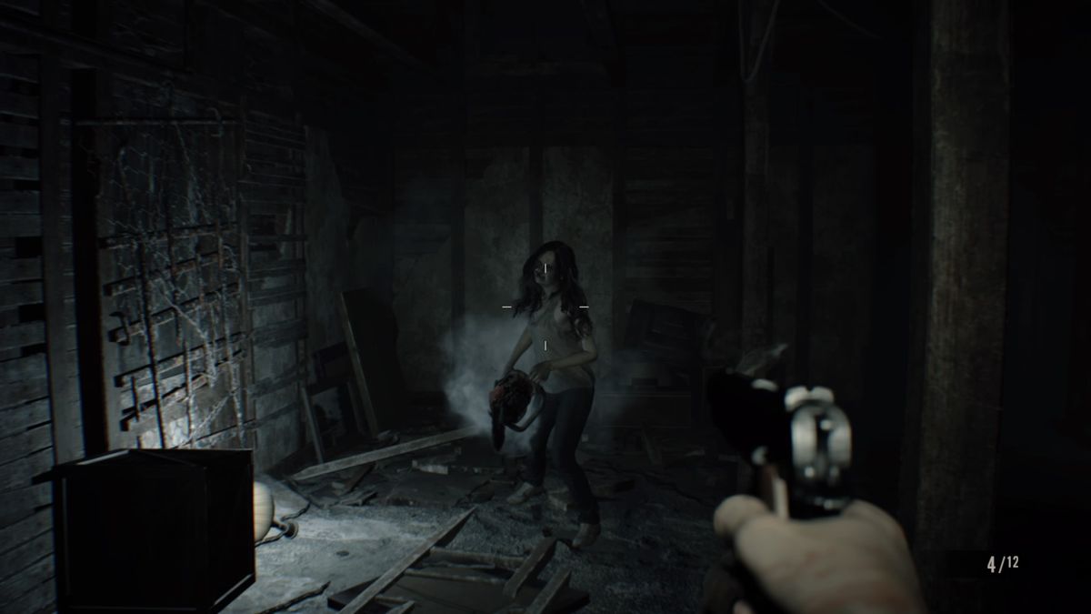 Resident Evil 7: Biohazard (PlayStation 4) screenshot: Don't bring a chainsaw to a gun fight
