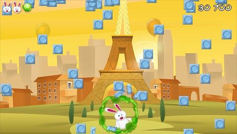 Bunny Dodge (PSP) screenshot: The lettuce / cabbage provides a shield against the grey blocks.