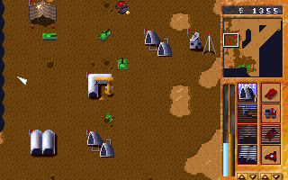 Arrakis (DOS) screenshot: Ordos tanks rampaging in a defenceless Harkonnen installation.