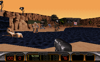 Duke Nukem's Penthouse Paradise (DOS) screenshot: This beach is where you start