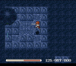 Ys V: Ushinawareta Suna no Miyako Kefin (SNES) screenshot: Boss battle against a weird blob on icy surface