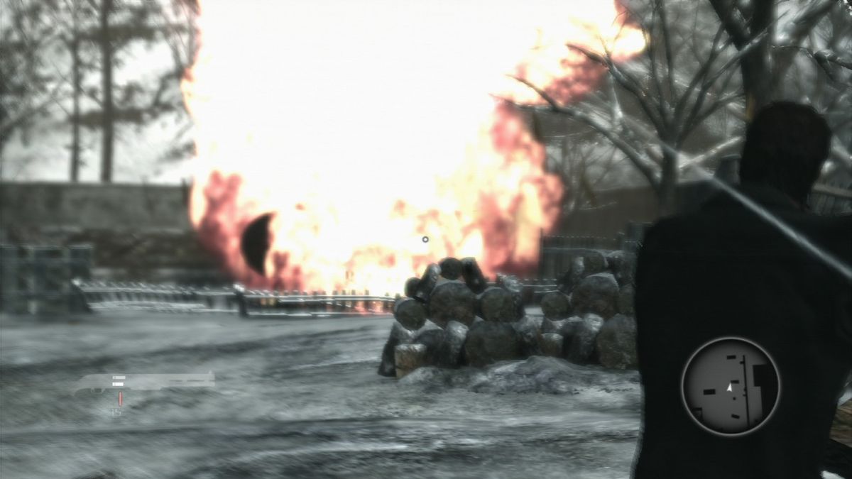 Robert Ludlum's The Bourne Conspiracy (PlayStation 3) screenshot: Blowing up a tank to mask your approach