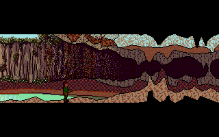 Legend of the Lost (Atari ST) screenshot: Level 2: in a cave, with a pistol, incredible jumping abilities and screen flipping