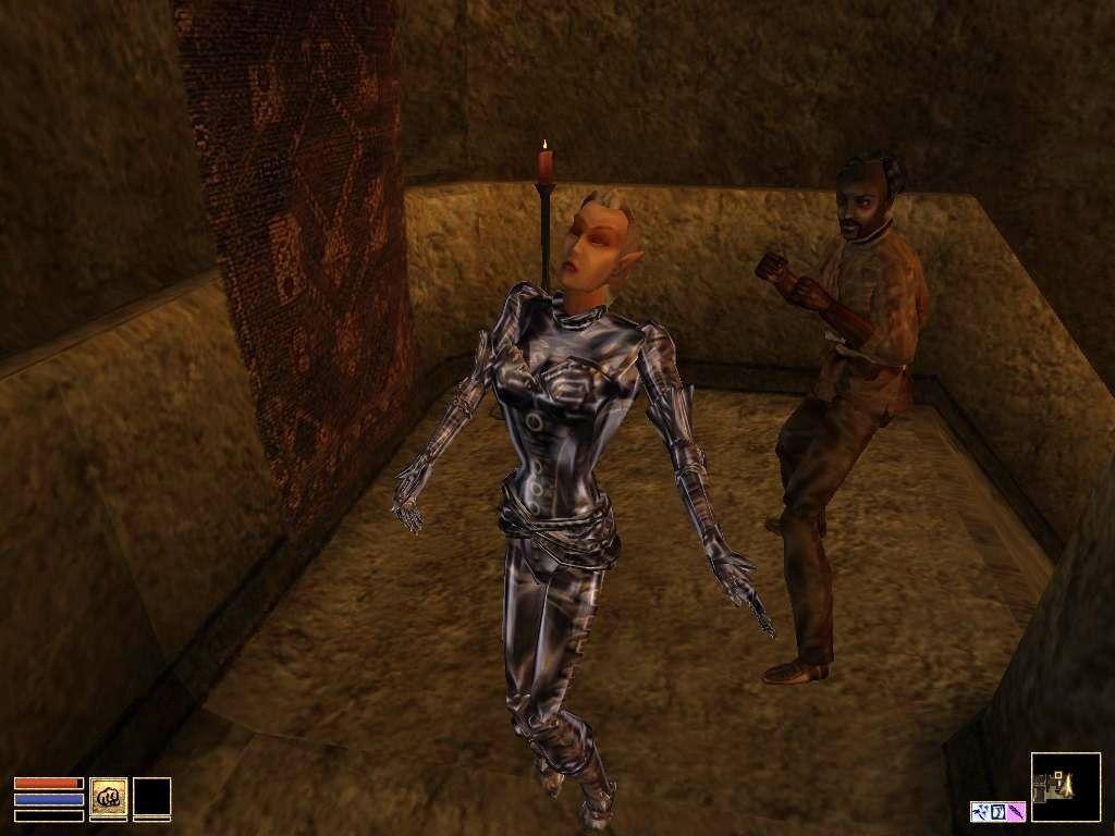 The Elder Scrolls III: Morrowind (Windows) screenshot: A female bosmer in domina clothing knocked out - what can she do now?..