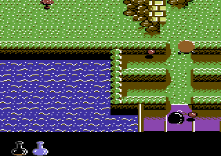 Wheelies (Commodore 64) screenshot: Baddie behind you. There's a mushroom for energy.