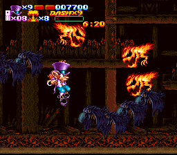 Nightmare Busters (SNES) screenshot: With bogeys coming in from all directions, Flynn prepares to deal 'em a few bad hands.