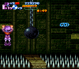 Nightmare Busters (SNES) screenshot: Will the old ball and chain send Flynn over the edge?