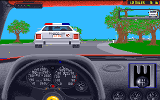 The Duel: Test Drive II (Amiga) screenshot: The police car is trying to slow you down.