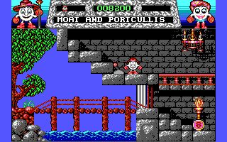 Fantasy World Dizzy (DOS) screenshot: Moat and portcullis (EGA mode)