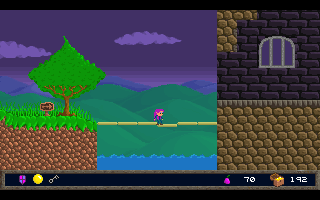 Jasper's Journeys (DOS) screenshot: Crossing a moat to enter the castle.