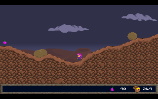 Jasper's Journeys (DOS) screenshot: This wasteland is full of boulders that can roll uphill as well as downhill in apparent defiance of the laws of gravity.