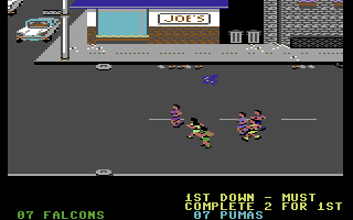 Street Sports Football (Commodore 64) screenshot: Field - Run, man! Run! Running to make a touch down.