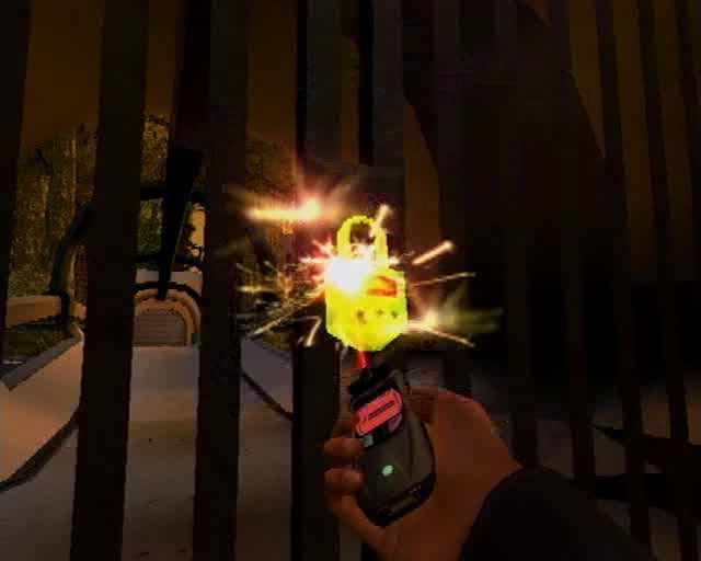 007: Agent Under Fire (PlayStation 2) screenshot: Following the language selection screen and the usual logo screens the James Bond theme music starts up and the game shows a montage of short video clips. Here the Q laser is opening a lock