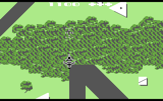Flak: The Ultimate Flight Experience (Commodore 64) screenshot: Flying over a forest.