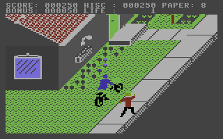 Paperboy (Commodore 16, Plus/4) screenshot: Riding on the grass.