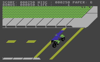 Paperboy (Commodore 16, Plus/4) screenshot: Crossing the road.