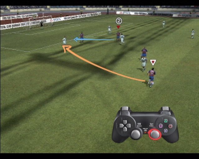 FIFA Soccer 2004 (PlayStation 2) screenshot: This is from the tutorial which shows the game's new 'off the ball' feature and allows the player on the ball to play the ball into space for another player to run onto
