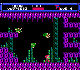 LayLa (NES) screenshot: Fifth asteroid cave, the fish don't shoot at you, but that green jumping thing does