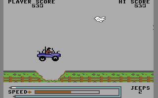 Jeep Command (Commodore 64) screenshot: Jumping a gap.