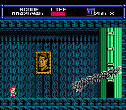 LayLa (NES) screenshot: Stage 3 boss is Espadra: some kind of metal dragon/snake thing. Machine Gun is your best bet here as Axes don't harm him at all