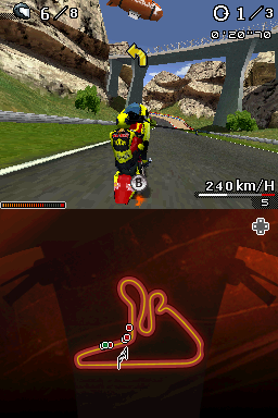 Moto Racer DS (Nintendo DS) screenshot: Doing a nitro wheelie on a Moto GP track.