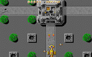 Foundations Waste (Atari ST) screenshot: Some halls with tanks inside must be destroyed first before the tanks are destroyable. Of course they are firing from inside all the time...
