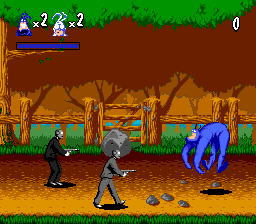 The Tick (Genesis) screenshot: In the woods. Throwing a rock at enemies