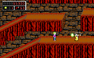 Commander Keen 4: Secret of the Oracle (DOS) screenshot: Take this, you... you... yellow reptile! (EGA)