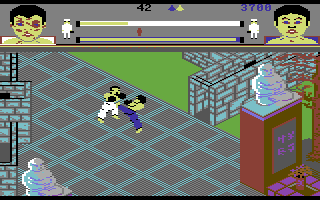 Thai Boxing (Commodore 64) screenshot: The more hits they take, the worse the fighter's faces look