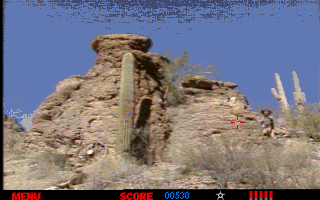 The Last Bounty Hunter (DOS) screenshot: A Gunman in the rocky hills