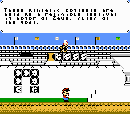 Mario's Time Machine (NES) screenshot: Hitting blocks gives you information about the current period.