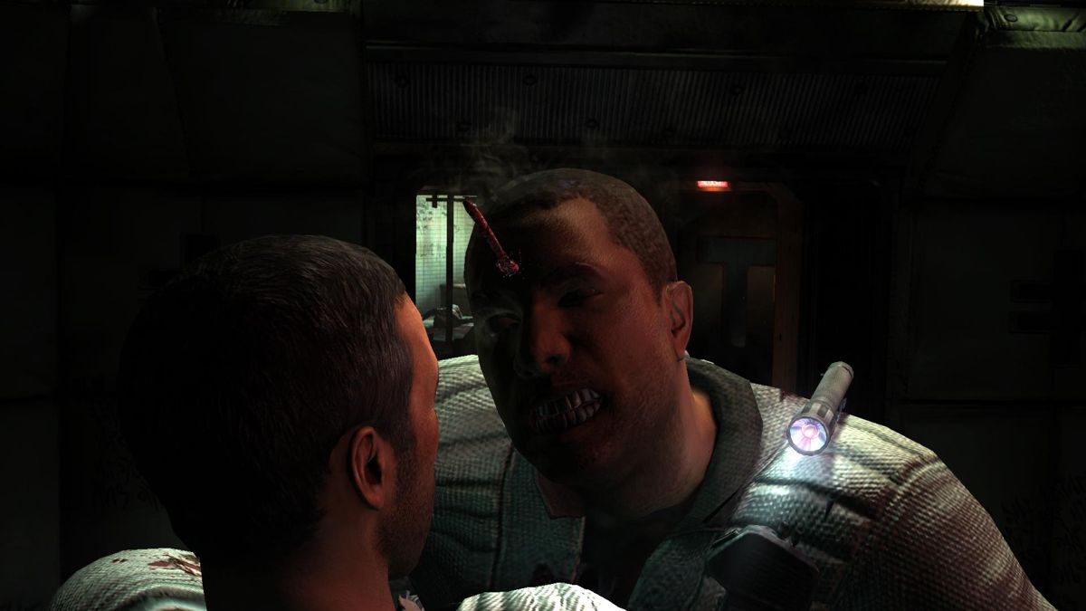 Dead Space 2 (Windows) screenshot: Ever wanted to see someone become a Necromorph up close and personal? Check out these next shots if you have the stomach for it.