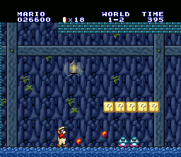 Super Mario All-Stars + Super Mario World (SNES) screenshot: Fire Mario can throw 2 fireballs at the "same time". Useful to eliminate weak enemies... at long distance!