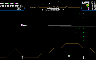 Defender (DOS) screenshot: The start of a game. The coloured particles assemble themselves into alien ships