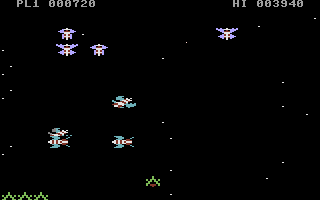 Galaxions (Commodore 16, Plus/4) screenshot: Aliens flying into formation