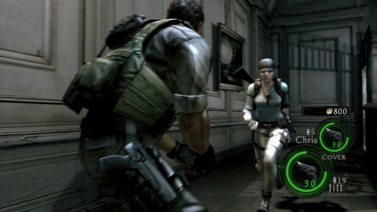 Resident Evil 5: Lost in Nightmares (PlayStation 3) screenshot: Chris assisting Jill in jumping to the other side of the collapsed floor.