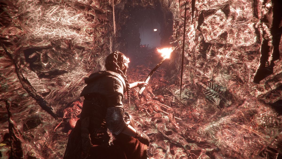 A Plague Tale: Innocence (Windows) screenshot: Underground, scaring off the rats with fire.