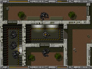 Alien Breed: Tower Assault (DOS) screenshot: Surrounded by aliens