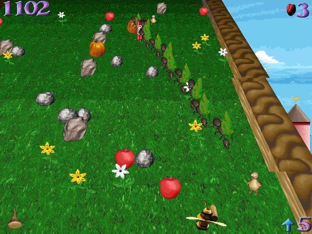 When Bugs Attack (Windows) screenshot: A line of ants approaches. The fruit, ducks and flowers are all objects that can be destroyed but which score no points