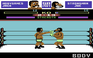 The Big KO! (Commodore 64) screenshot: Throwing a punch to his head