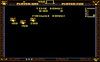 Gremlins (Commodore 64) screenshot: Level complete - Mogwai bonus!